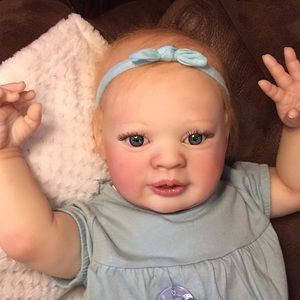 Reborn baby girl doll RESERVED FOR DANA MACGUGAN